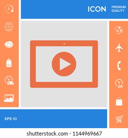 Computer tablet with play button icon