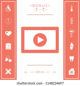 Computer tablet with play button icon