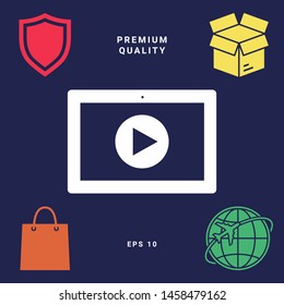 Computer tablet with play button icon. Graphic elements for your design