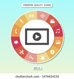 Computer tablet with play button icon. Graphic elements for your design