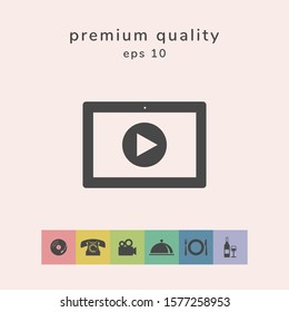 Computer tablet with play button icon. Graphic elements for your design