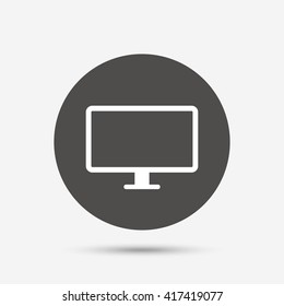 Computer widescreen monitor sign icon. Gray circle button with icon. Vector