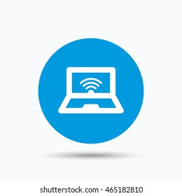 Computer with wifi icon. Notebook or laptop pc symbol. Blue circle button with flat web icon. Vector