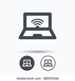 Computer with wifi icon. Notebook or laptop pc symbol. Circle buttons with flat web icon on white background. Vector