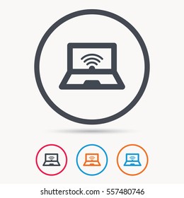 Computer with wifi icon. Notebook or laptop pc symbol. Colored circle buttons with flat web icon. Vector