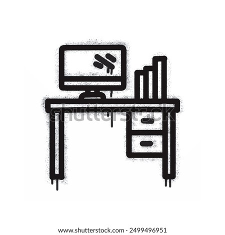 Computer work desk graffiti spray painted black on white.