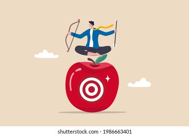 Concentration and focus on business goal or target, business plan for winning strategy concept, businessman archery holding arrow and bow meditate and focus on bullseye target at the center of apple.