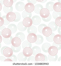 Concentric circles with dotted outline in two colors. Seamless geometric pattern on white background. Vector image