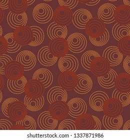 Concentric circles with dotted outline in two colors. Seamless geometric pattern on brown background. Vector image
