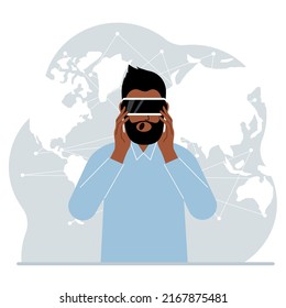 The concept of augmented or extended reality. Man wearing 3D glasses or virtual reality headset. On the background of the world map. Vector flat illustration