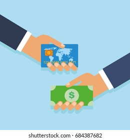 Concept of cashing money from a bank card. Hand giving money to other hand. Hand with a bank card