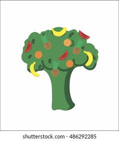 Concept: Christmas vegetarian  tree. Broccoli, decorated with toys in the form of fruit: banana, watermelon, orange, pineapple. On a white background