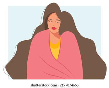 The concept of colds, flu, Severe cough. A young unhappy woman is sitting in a blanket and feels sick. The girl is sad.