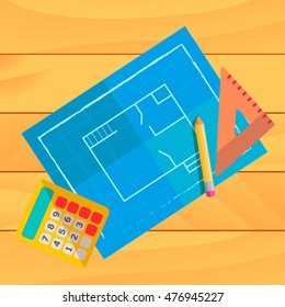 Concept of construction and design. Constructing plan on wooden background