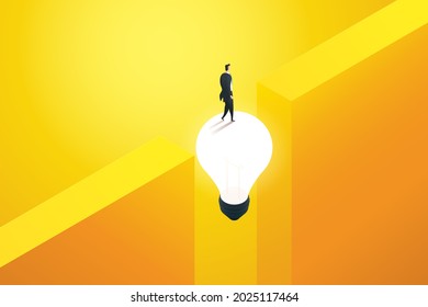 Concept creativity to solve problems and the prospects of business and career success. Businessman walks on lightbulb across a cliff gap. vector illustration