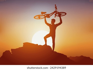 Concept, with a cyclist who, as a sign of victory, lifts his mountain bike to the top of a mountain in front of a sunset.