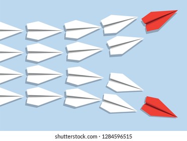 Concept of divergence of opinion with 2 columns of origami airplanes separating in two directions