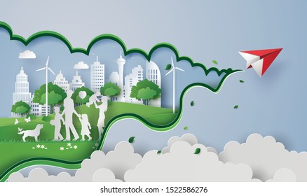 concept of eco with happy family on the field and paper plane .paper art cut style