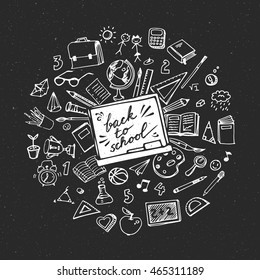 Concept of education. School background with hand drawn school supplies on blackboard. Back to school.