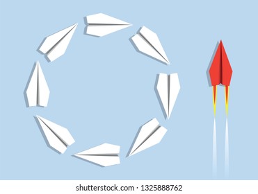 Concept of efficiency in opposition to inefficiency with a side of origami planes that turn stupidly round and on the other, a red plane that acts with intelligence.
