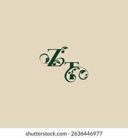 concept of elegant beautifull TZ with monogram and leaf letter wedding organic logo