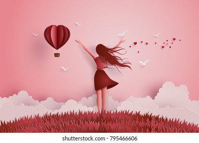 Concept Of Freedom, Love Or Valentine's Day, Paper Art And  Digital Craft Style. Beautiful Girl Stretches Her Arms To The Sky With Paper Heart Balloon.