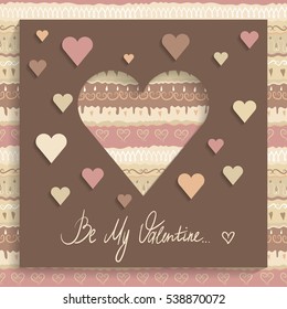Concept of greeting card for Valentine's Day. Brown paper square with cut out heart, applique and hand-written inscription "Be My Valentine". Seamless pattern of coffee colors on the background.