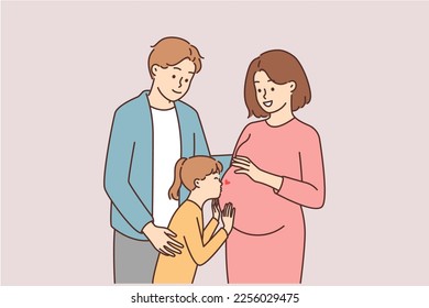 The concept of a happy young family. Waiting for a new family member. Full and happy big family. Child kisses belly of pregnant mother.