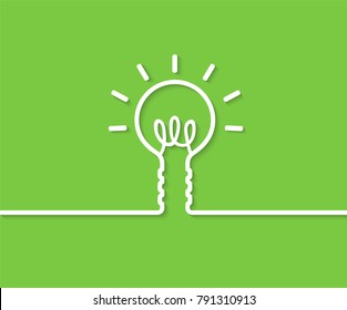 Concept Idea eco, White light bulb. On a green background