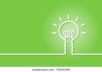 Concept Idea eco, White light bulb. On a green background