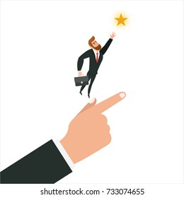 Concept illustration of a businessman hand picking up a star