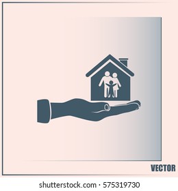 Concept illustration of safety of house and family. Family house in hand.Vector icon.