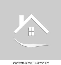 Concept image of an abstract house design isolated on a gray background.