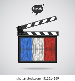 Concept of learning languages. Study French. Movie production clapper board with hand drawn French flag. Film in French.