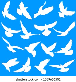 Concept of love or peace. Set silhouettes doves.