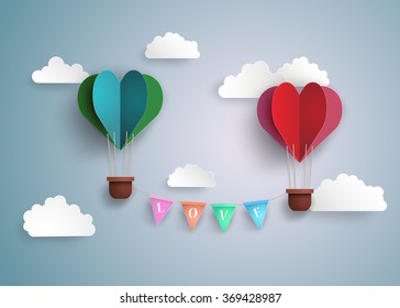 concept of love and valentine day, origami made hot air balloon in a heart shape . paper art style.