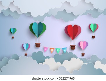 concept of love and valentine day,origami made hot air balloon in a heart shape.paper art and craft style.