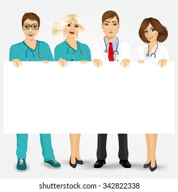 Concept for medical workers. Group of doctors and nurses holding a blank billboard