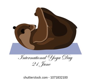 Concept on the International Yoga Day on June 21, the bear engages in yoga