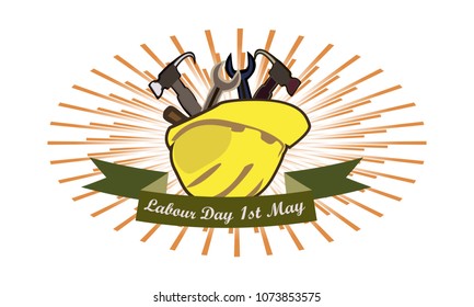 Concept on a World Labour Day 1 May, tools in a construction helmet
