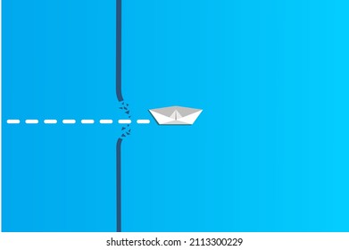 Concept of overcoming barriers on the way to goal with white paper ship breaking through obstacle on blue background. Deal with difficulties on the way to target.