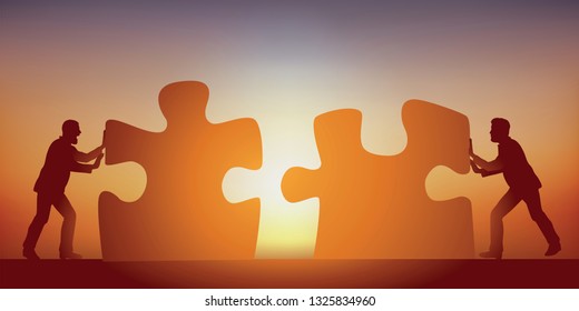 Concept of the partnership to find a solution to a problem, with two men who share their intelligences, symbolized by two pieces of puzzle.