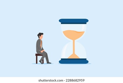 CONCEPT OF PATIENCE, TIME MANAGEMENT, AND SCHEDULE. A MATTER OF TIME. WAITING FOR HARD WORK RESULTS NEED PATIENCE. BUSINESSMAN WAITS IN FRONT OF THE HOURSAND