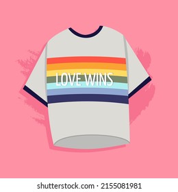 El concepto de Orgullo. Una camiseta con una bandera arco iris y la inscripción amor gana.   El concepto de LGBTQ. Apoyo a los homosexuales. Igualdad y protección del amor.