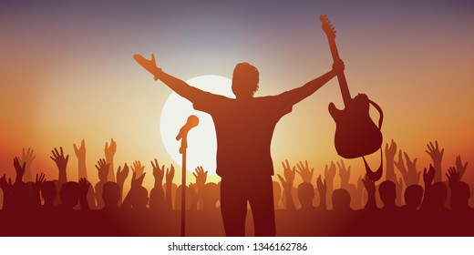 Concept Of Rock Music Concert With A Singer Greeting His Audience Brandishing His Guitar And Crowd Applauding Him At The End Of The Show.
