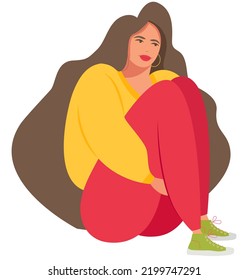 The concept of a sad girl sitting and hugging her knees. The girl is in a depressed mood, needs to maintain mental health. She feels professional burnout, fatigue.