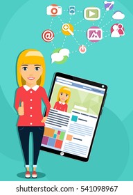 The concept of social networking. Young attractive girl puts thumbs up in approval of the social network. Happy girl