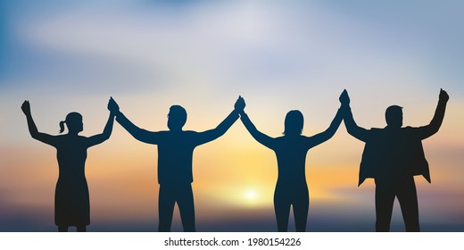 Concept of solidarity and success with four people joining hands in friendship.