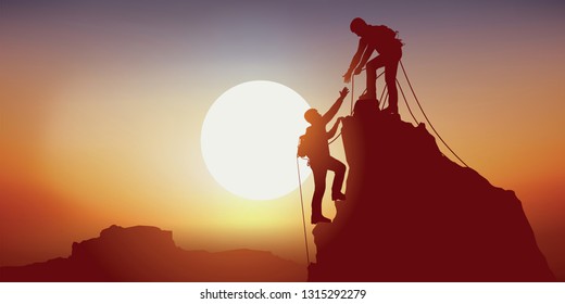 Concept of solidarity, with two mountaineers holding out their hand reaching the top of a mountain, having climbed it successfully