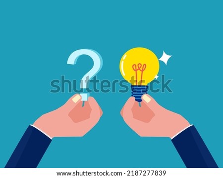 concept of solving the problem. businessman holding a question mark with a light bulb 